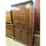 19th Century figured mahogany bookcase, the moulded cornice above a pair of arched figured panel