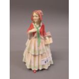 Early 20th Century Royal Doulton figure ' Clemency ', HN1643 Minor paint loss to bonnet, otherwise