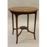 Edwardian circular mahogany and parquetry inlaid occasional table on square cut supports with