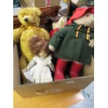 Gold plush teddy bear with jointed limbs, glass eyes and leather pads, 22ins high approximately,