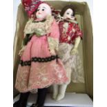 Small late 19th / early 20th Century bisque headed doll with fixed eyes and kid leather body,