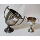 Two silver trophy cups, (at fault) 9 troy ounces