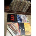 Three boxes containing a large collection of 1960's LP's including Pink Floyd, The Beatles, Stevie