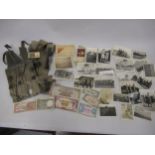 Quantity of military related photographs, small quantity of bank notes and two ammunition pouches