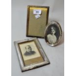 Two rectangular silver mounted photograph frames, together with an oval silver mounted photograph