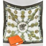 Hermes, Paris, silk scarf ' Cuivreries ' designed by Francoise de la Perriere, 85cms square, in a