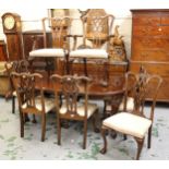 Set of nine (seven plus two) mahogany dining chairs in Chippendale style, the carved pierced splat