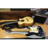 Vintage Hondo Deluxe Series 760 electric guitar SKAK 20RA guitar amplifier and an acoustic guitar by