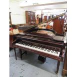 Mahogany cased baby grand piano by Challen, London, the interior having undergone a recent