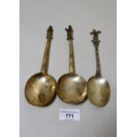 Pair of Victorian silver Apostle handled spoons, together with a Dutch silver spoon with windmill