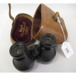 Pair of early 20th Century black japanned and leather mounted field binoculars by Ross, London, in