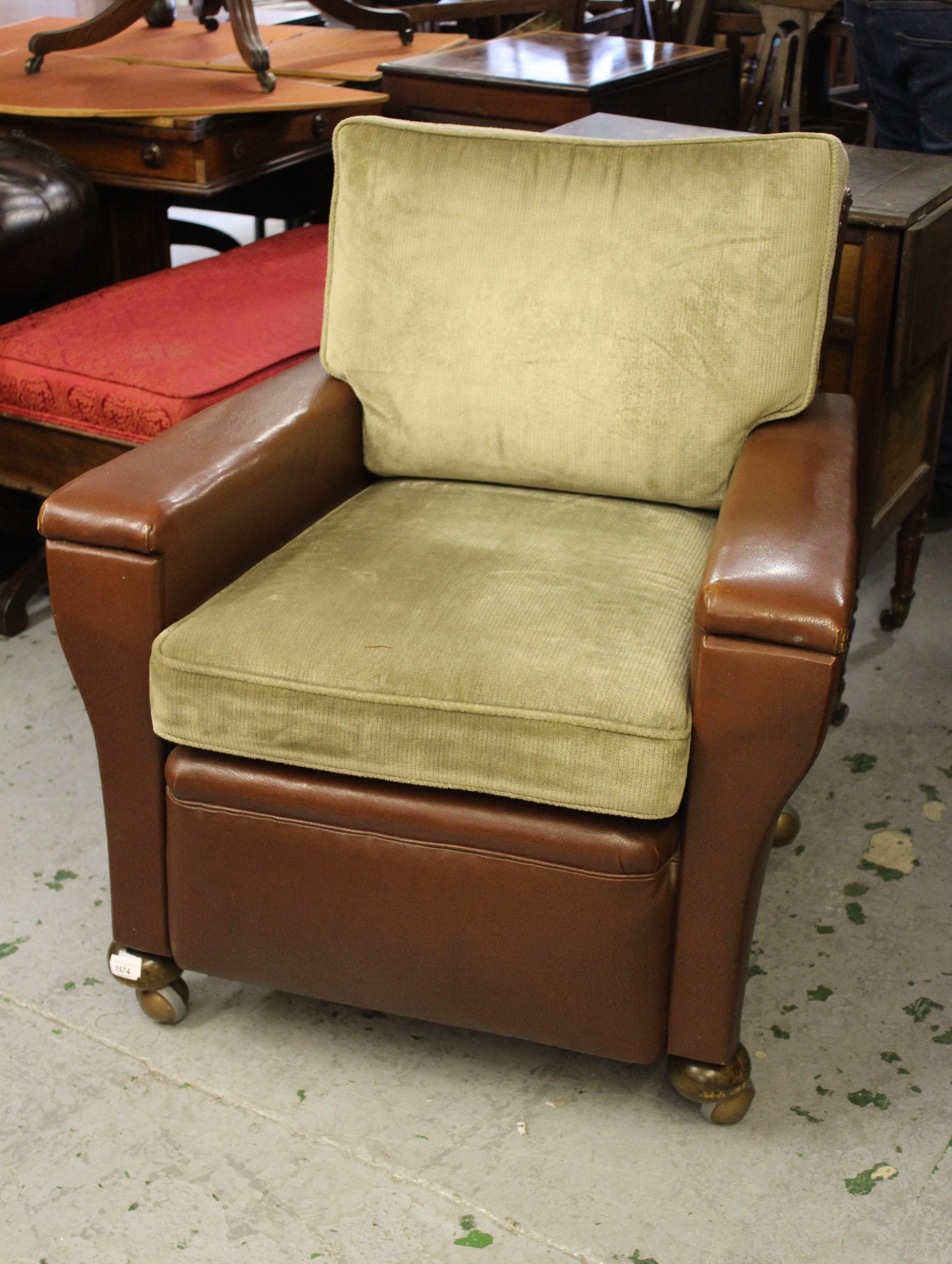 1930's Brown rexine covered club type armchair on low bun front supports