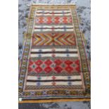 Kelim and part piled rug of alternating panel design with borders, 6ft 8ins x 3ft 8ins approximately