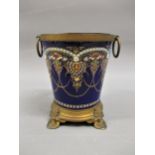 French gilt metal mounted blue pottery, floral decorated two handled small jardiniere, 4.75ins