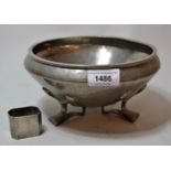 English pewter bowl of stylised form No.01128, and a pewter napkin ring