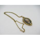 15ct Gold oval pearl mounted pendant locket, on a 15ct gold chain