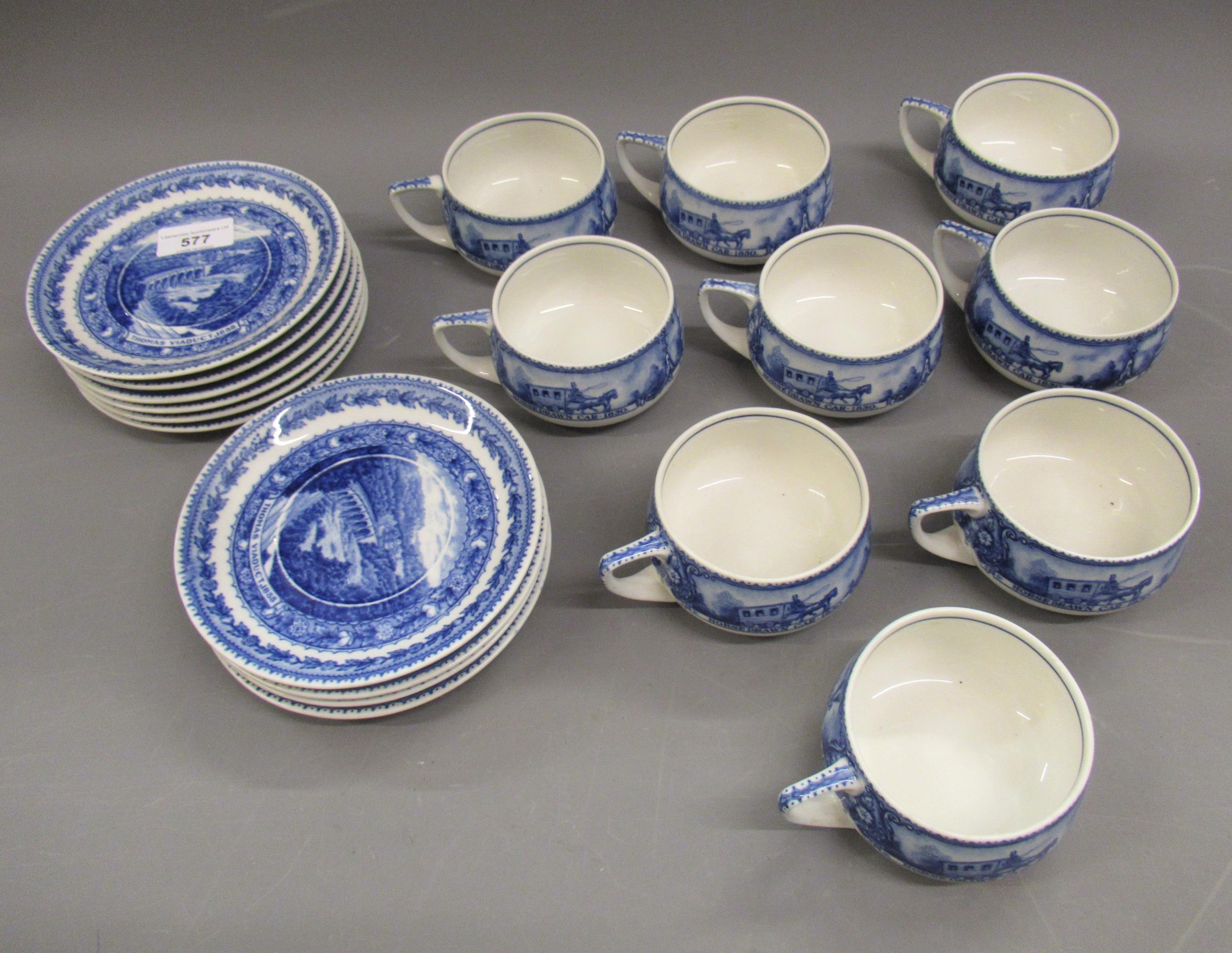 Set of eight Scamell's Lamberton China blue and white transfer printed cups decorated with