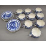 Set of eight Scamell's Lamberton China blue and white transfer printed cups decorated with
