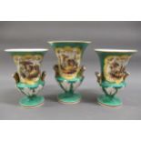 Garniture of three 19th Century English flared rim vases, each painted with cottages in