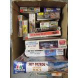 Box containing fourteen plastic model kits