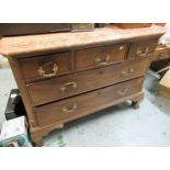 19th Century mahogany commode, the rouge marble top above three short and two long drawers with cast