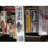 Box containing ten various model kits of tanks, military vehicles, sports cars, including Airfix,