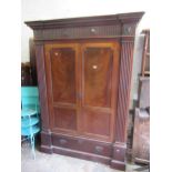 Large 19th Century mahogany two drawer wardrobe, the moulded dentil cornice above a moulded frieze