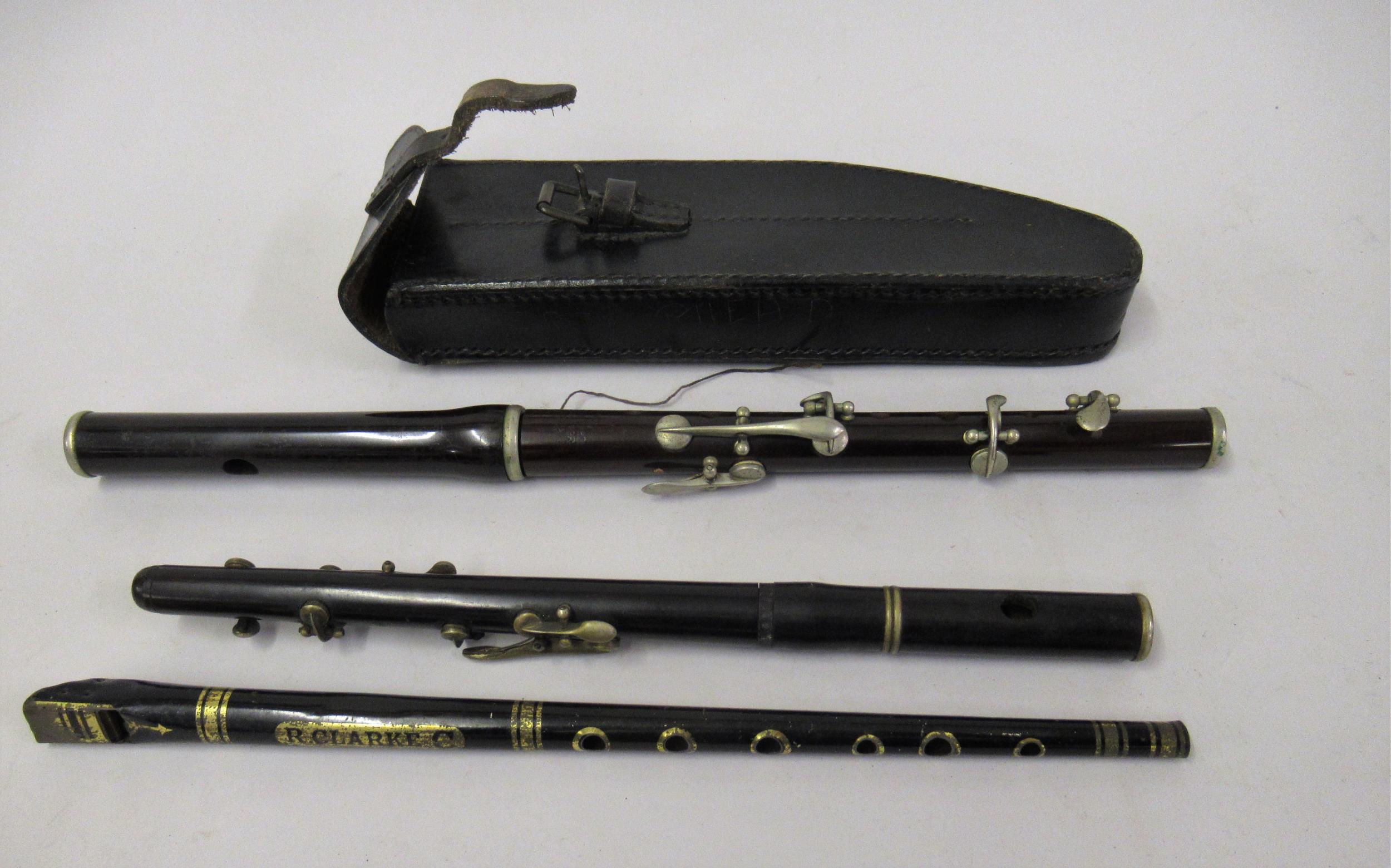 Early 20th Century fife with nickel plated mounts by Potter of London, in a leather case together