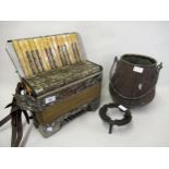 Early to mid 20th Century piano accordion, (at fault), copper swing handled pot and a iron trivet