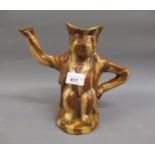 Terracotta treacle glazed toby jug, 7.5ins high