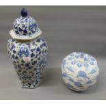 Chinese blue and white ginger jar, and a Chinese blue and white bluster form vase and cover