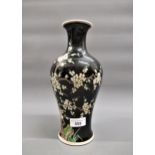 20th Century Chinese porcelain famille noire baluster form vase decorated with birds and blossom,