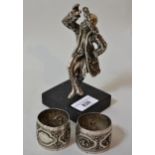 Modern (925 mark) silver covered resin figure of a dancing man, and a pair of Indian white metal