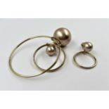Christian Dior, pair of Mise en Dior earrings of asymmetric form