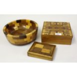 Square parquetry inlaid box together with a similar smaller box and a turned wooden fruit bowl