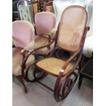 Modern bentwood rocking chair with cane back and seat