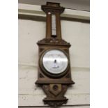 Victorian carved oak aneroid barometer/ thermometer