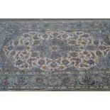 Indo Persian rug with a lobed medallion and all-over stylised floral design on an ivory ground