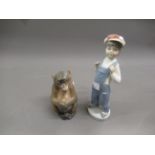 Royal Copenhagen figure of a monkey, 5ins high, together with Lladro figure of a boy