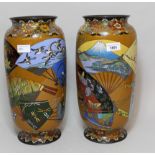 Pair of large Japanese cloisonne baluster form vases decorated with panels of birds, butterflies and