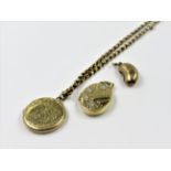 9ct Gold locket on an unmarked yellow metal chain, a modern 9ct gold locket and an unmarked bean
