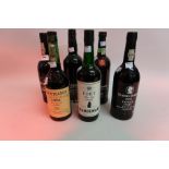 Six bottles of port including Dow's 1970, Graham's 1981, Sandeman Quarles Harris 1983, Fonseca