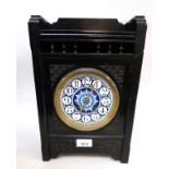 English ebonised Aesthetic movement mantel clock by Elkington & Co., the blue enamel dial with