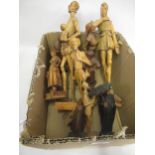 Collection of Spanish carved wooden figures of Don Quixote and other subjects