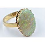 9ct Gold ring set large oval opal of good colour, approximately 21 x 14mm overall, size 'R' 6.2g.