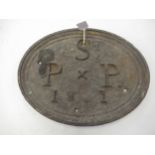 Antique oval cast iron wall plaque, with raised lettering STPP (16.5ins wide)