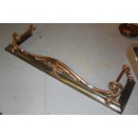 Good quality polished copper and steel fire kerb of stylised floral design, 53ins wide