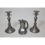 Pair of pewter candlesticks, an Arts & Crafts pewter and enamel jug marked Terry, Manchester