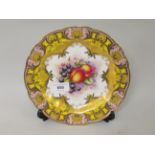 Royal Worcester cabinet plate, painted with fruits by R. Lewis, within a yellow, pink and gilt