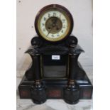 Large 19th Century black slate and rouge marble mantel clock, the enamel chapter ring with Arabic